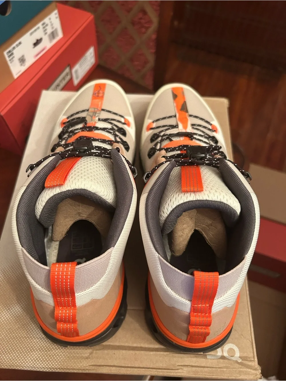 Men’s On Cloudtrax Shoes in Chalk/Ivory with Orange Accents